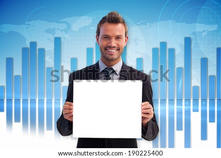 Businessman showing card against global business graphic in blue