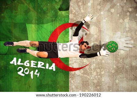 Goalkeeper in white making a save against algeria flag in grunge effect