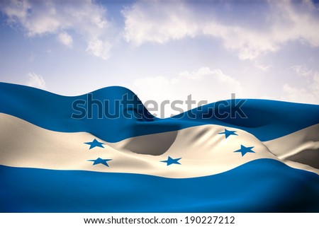 Honduras flag waving against beautiful blue sky
