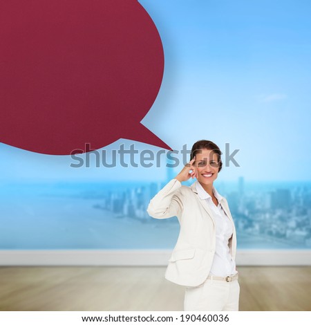 Thinking businesswoman with speech bubble against city projection on wall