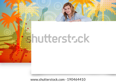 Composite image of businesswoman showing white card