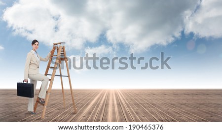 Businesswoman climbing career ladder with briefcase and looking at camera against cloudy sky background