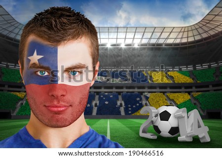 Composite image of serious young chile fan with face paint against large football stadium