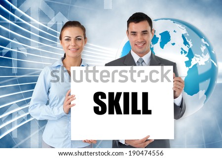 Business partners holding card saying skill against global business graphic in blue