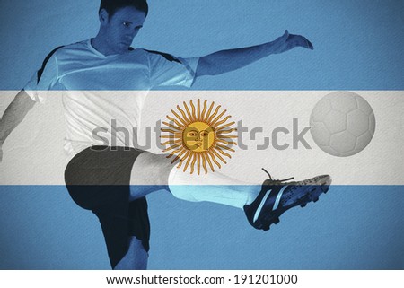 Football player in white kicking against argentina national flag