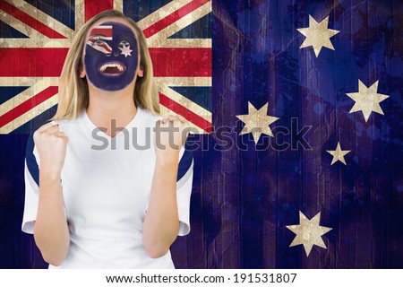 Excited australia fan in face paint cheering against australia flag in grunge effect