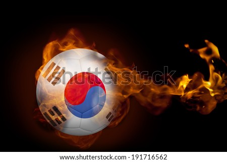 Composite image of fire surrounding korea republic ball against black