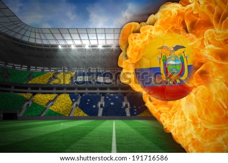 Composite image of fire surrounding ecuador flag football against large football stadium with brasilian fans