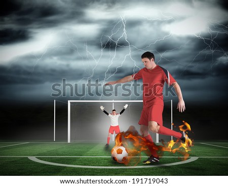 Composite image of football player about to take a penalty against football pitch under stormy sky