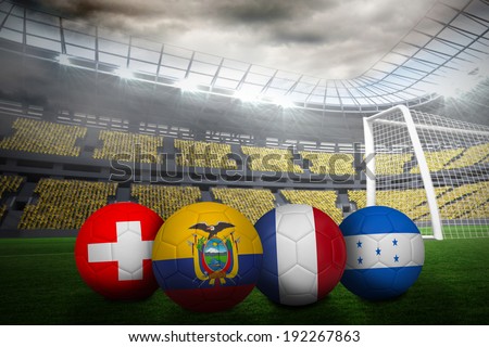 Group e world cup footballs in large stadium