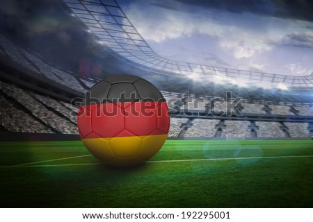 Football in germany colours in large football stadium with lights