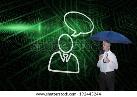 Businessman and speech bubble against green and black circuit board
