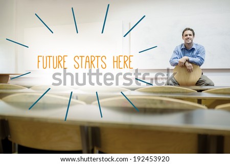 The word future starts here against lecturer sitting in lecture hall