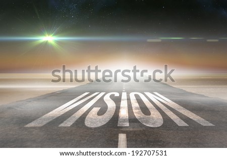 The word vision against road leading out to the horizon