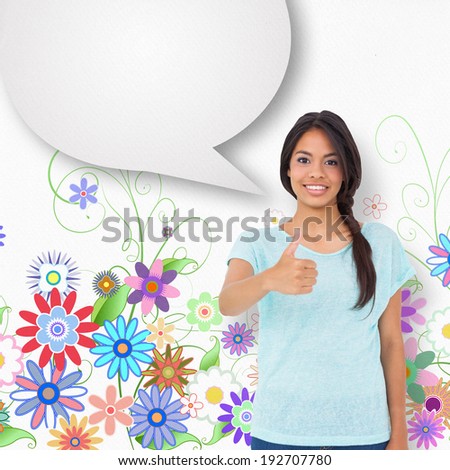 Happy brunette giving thumbs up with speech bubble against digitally generated girly floral design