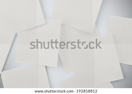 White paper strewn over grid paper
