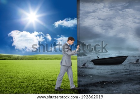 Composite image of businessman pushing away scene of sail boat being circled by sharks