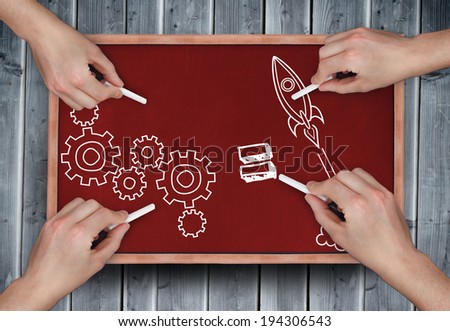 Composite image of multiple hands drawing doodles with chalk on wooden board