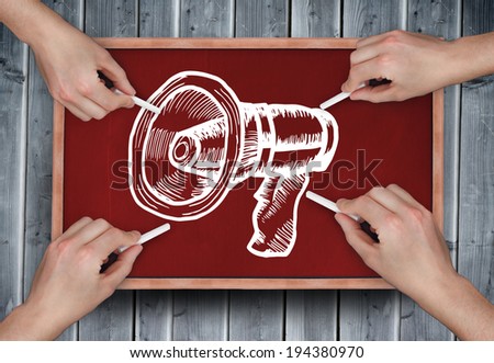 Composite image of multiple hands drawing megaphone with chalk on wooden board
