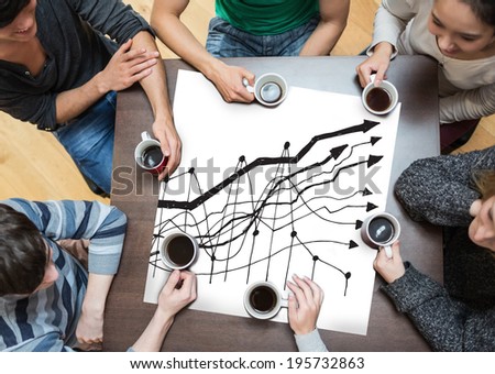 People sitting around table drinking coffee with page showing data analysis doodle