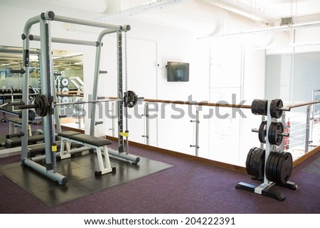 Empty weights room with bench press at the leisure center