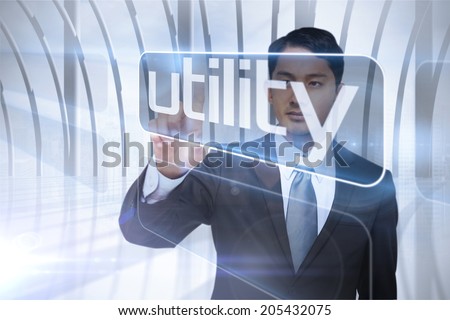 Businessman presenting the word utility against white room with large window overlooking city