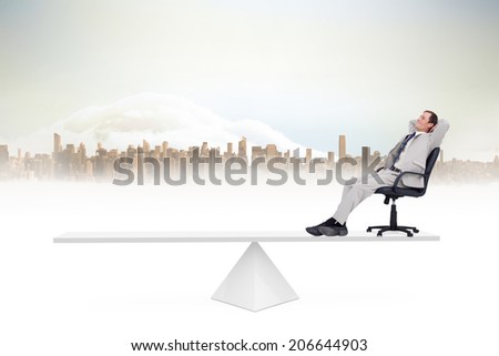 White scales weighing businessman on chair against cityscape