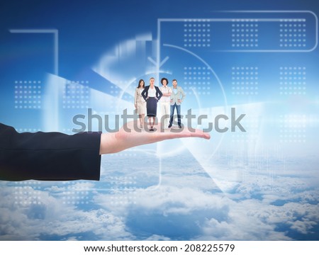 Business team looking at camera against blue sky over clouds at high altitude