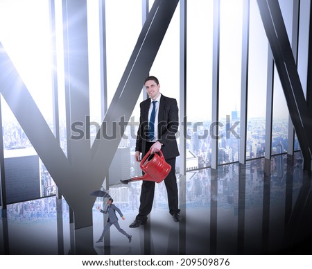 Businessman watering tiny businessman against room with large window looking on city
