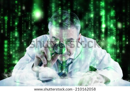 Mature businessman running diagnostics against lines of green blurred letters falling