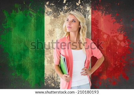 Young pretty student smiling against italy flag in grunge effect