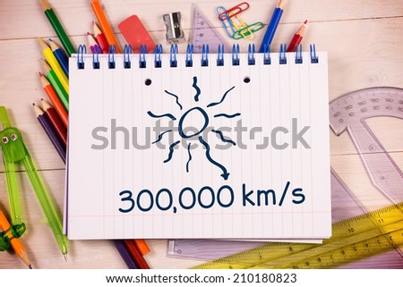 Distance to the sun on notepad against students desk