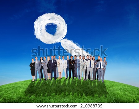 Business people standing up against cloud magnifying glass