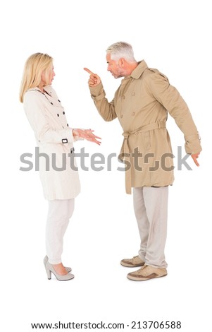 Angry couple fighting in trench coats on white background