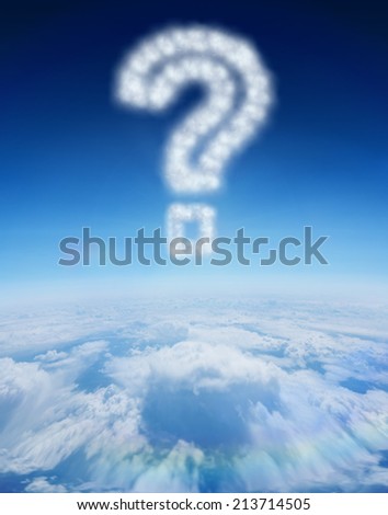 Cloud in shape of question mark against blue sky over clouds at high altitude