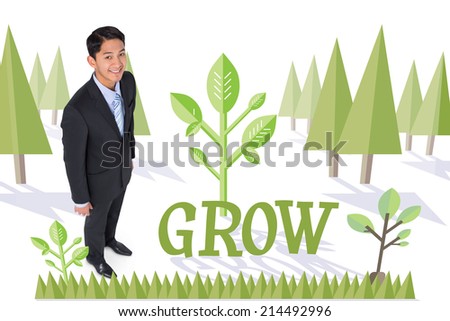 The word grow and smiling asian businessman against forest with trees