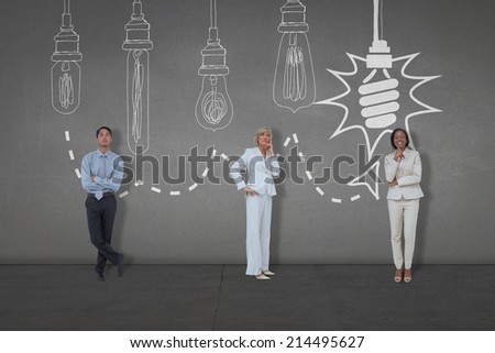Composite image of business people standing against black wall