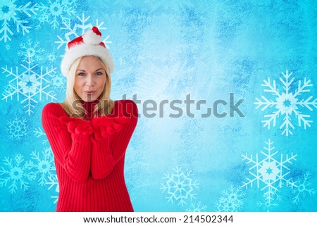 Happy festive blonde against blue snow flake pattern design