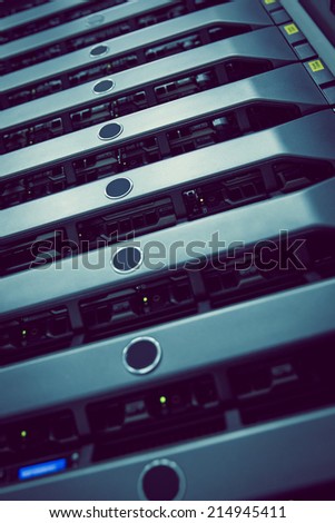 Black rack mounted server tower in large data center