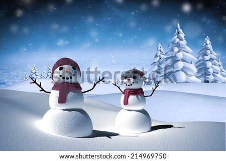 Snow people against white clouds under blue sky