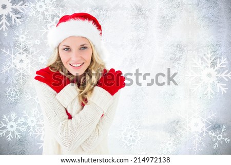 Happy festive blonde against silver snow flake pattern design