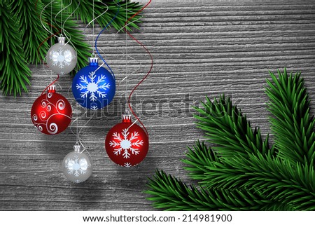 Digital hanging christmas bauble decoration against digitally generated fir tree branches