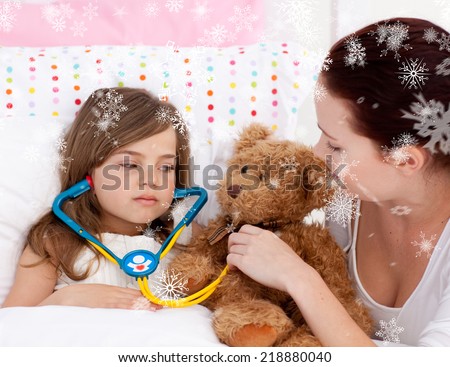 Composite image of Sick daughter playing with a stethoscope with her mother with snowflakes