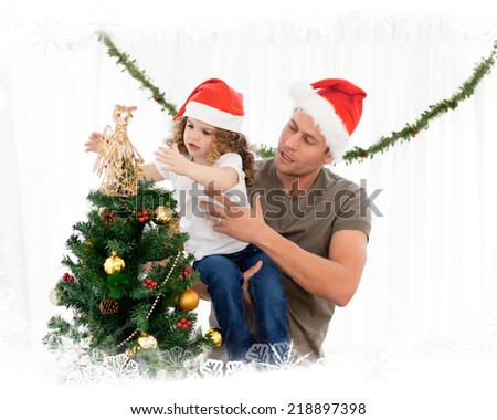 Cute daughter decorating the christmas tree with his father against frost frame