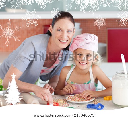 Laughing mother and her daughter baking in a kitchen against fir tree forest and snowflakes