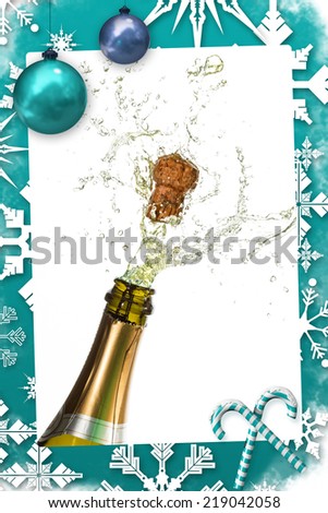 Christmas frame against bottle of champagne popping