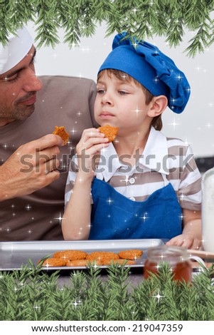 Composite image of a Father and son eating cookies against twinkling stars