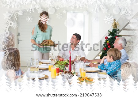 Mother serving Christmas meal to family against fir tree forest and snowflakes