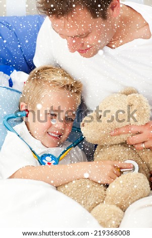 Composite image of Positive father and his sick son playing with a stethoscope with snow falling