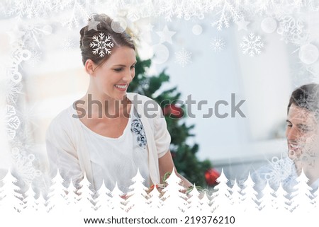 Attractive woman bringing a roast chicken at table against fir tree forest and snowflakes